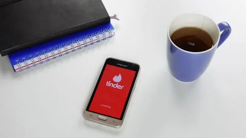 The Tinder application is loaded for a very long time Stock Footage 99836319