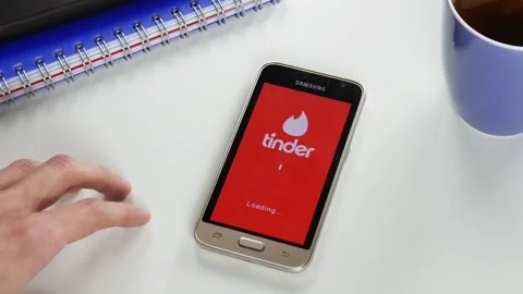 The Tinder application takes a very long time to load Stock Footage 99836409