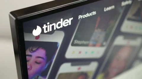 Tinder Dating app Website on a Computer Screen Closeup Stock Footage 218338822