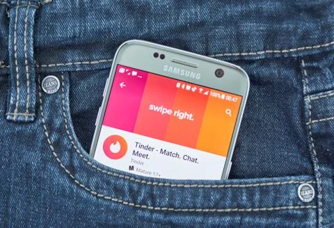 Tinder mobile application on screen of Samsung Photos