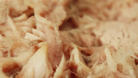 Tinned canned Tuna fish macro close up presentation slowly rotating stock f.. Stock Footage 344698991