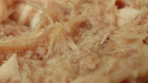 Tinned canned Tuna fish macro close up presentation slowly rotating stock f.. Stock Footage 344699461