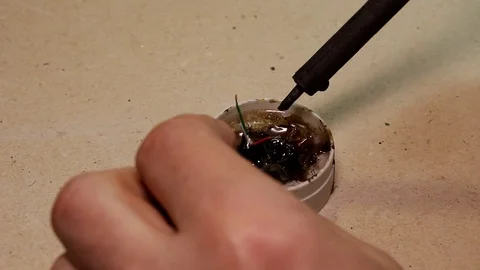 Tinning of soldering electrical wire Stock Footage 100854941
