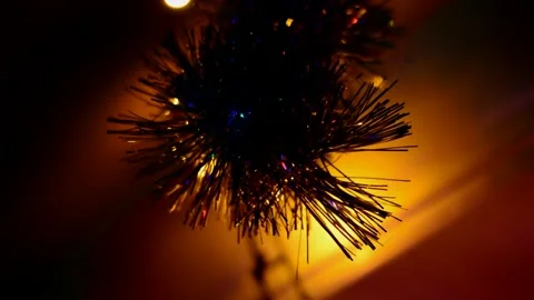 Tinsel hangs on the window Stock Footage 246867187