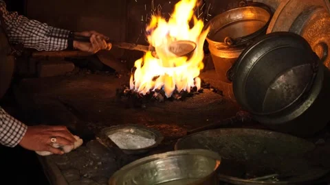 Tinsmith cleaning the copper pot Stock Footage 294130359