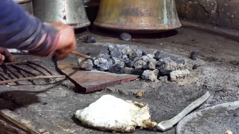 A tinsmith working in the workshop Stock-Footage 243844552