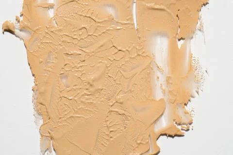 Tinted foundation smudge background Foto stock