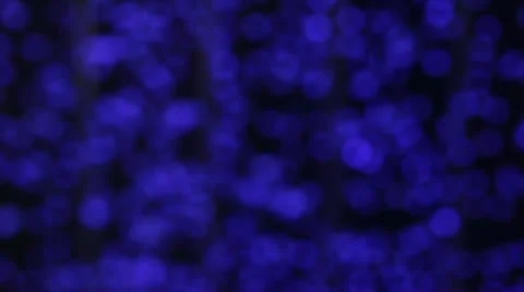 Tiny air bubbles rise in water against a black background (defocus) Stock Footage 22357913