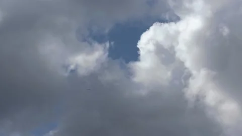 Tiny Airplane Through the Clouds Stock Footage 171946162