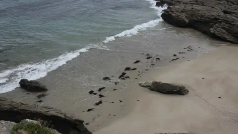 A tiny beach in the Cantabrian sea in Galicia, Spain Stock Footage 236201664