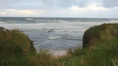 Tiny beach in the Cantabrian sea in a windy and cloudy afternoon Stock Footage 236941499
