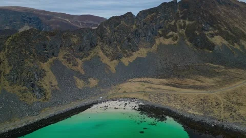 Tiny beach at the corner of the ridge hills Stock Footage 275776451