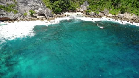 Tiny Beach Under a Cliff in Nusa Penida Stock Footage 152867274