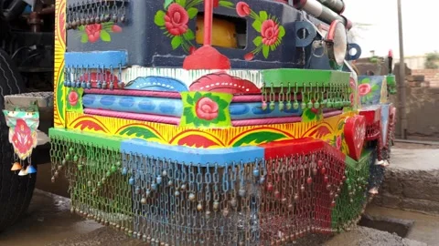 Tiny bells hanging from the front of a traditional Pakistani Jingle Truck Stock Footage 132928043