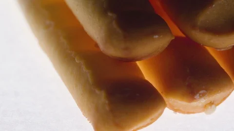 The tiny bits on the top of the bread on a macro shot Video stock 102387829