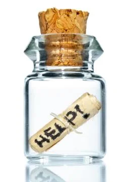 Tiny bottle with help message Foto stock
