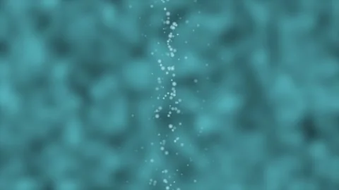 Tiny bubbles ascend in turquoise water during a gentle underwater current w.. Stock Footage 342520321
