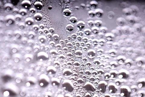 Tiny Bubbles on a Colour Background Condensation Steam Water 스톡 사진