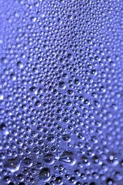 Tiny Bubbles on a Colour Background Condensation Blue Steam Water 스톡 사진