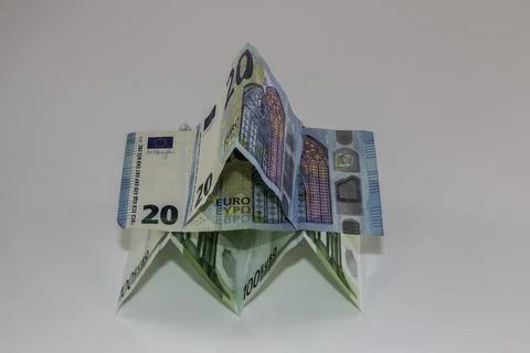 A tiny building made of different Euro banknotes Фото