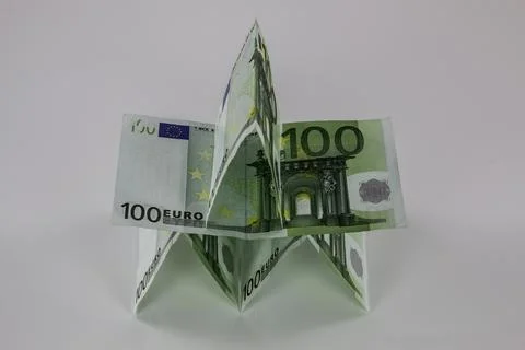 A tiny building made of different Euro banknotes Stock Photos