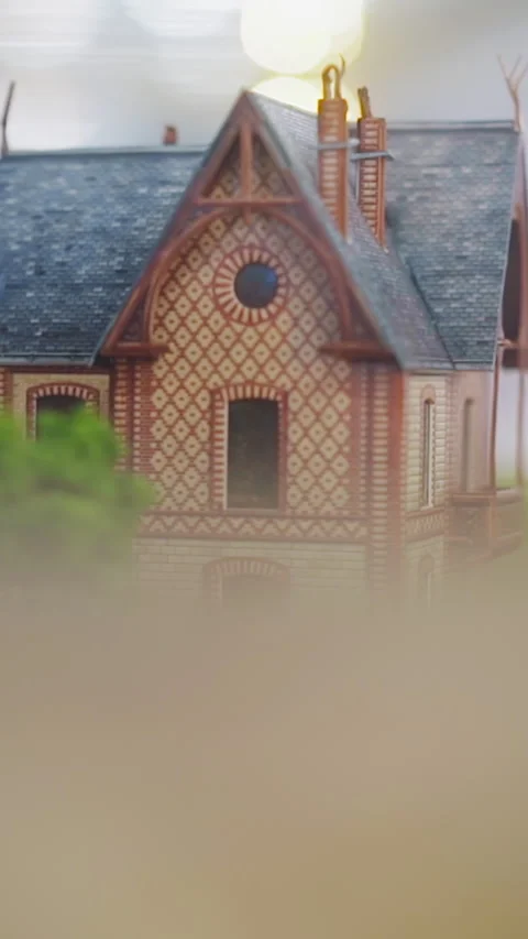 Tiny buildings with arch on facade at old city model in mall Stock Footage 317796489