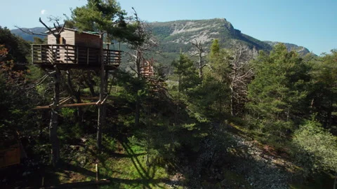 Tiny cabin, off-grid tree house or treehouse, Europe Stock Footage 248213282