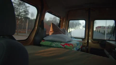 Tiny campervan interior at sunset parked in urban area Stock Footage 331408290