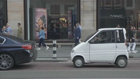 Tiny car silly in amsterdam Stock-Footage 157341671