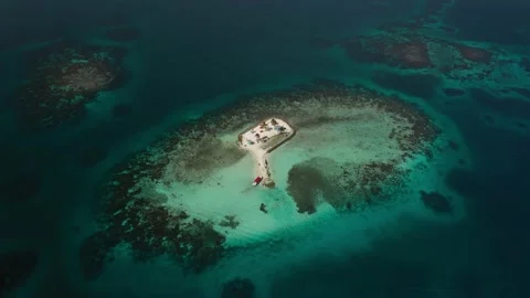 Tiny Caribbean Island Barrier Reef Ocean Aerial Drone Shot Stock Footage 236165743