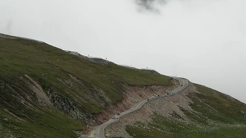 Tiny cars effect drive on high mountain road Stock Footage 91446231