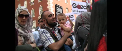 Tiny Child in Crowd at Gaza Rally London UK 2014 Stock Footage 144324807