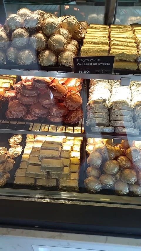 Tiny Chocolate Treats in Foil Stock Footage 303649092