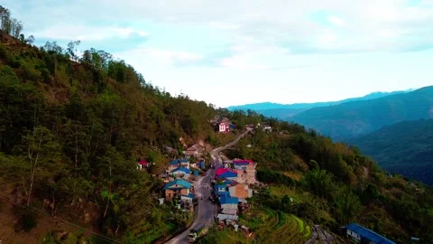 A tiny city with a road and jungle Stock Footage 275567299