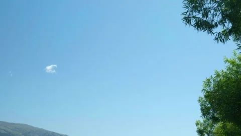 Tiny cloud in sky Stock Footage 260370170