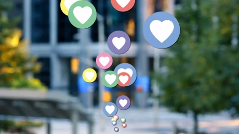 Tiny cluster sparking colorful heart badges rising rotating stacking to form 库存影片 334418805