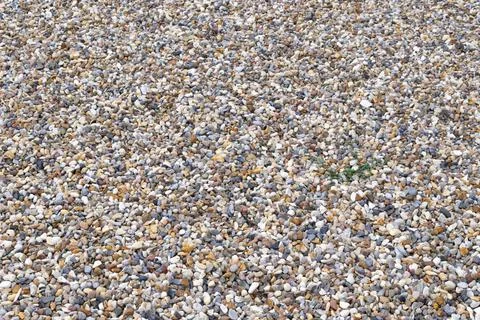 Tiny colored pebbles with visible details. background or texture Stock Photos
