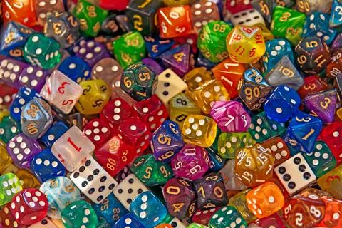 Tiny colorful dices for playing games Stock Photos