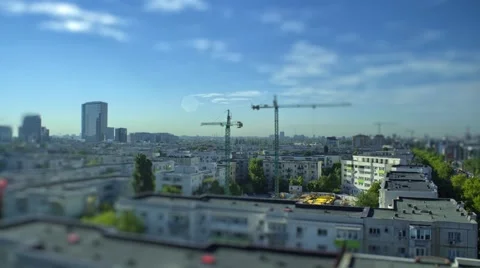 Tiny construction site and a crane surrounded by communist blocks Stock Footage 63097934
