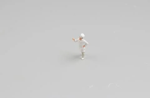 Tiny  of cook are talking in the kitchen. Stock Photos