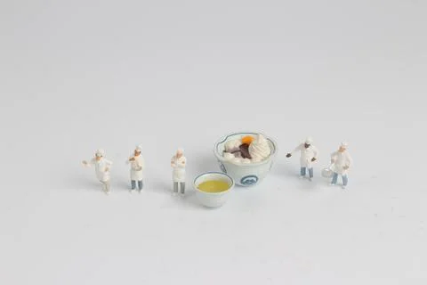 Tiny of cook are talking in the kitchen. 스톡 사진