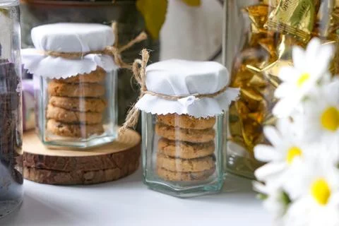 Tiny Cookie Jars with Twine and Floral Decor Stock Photos