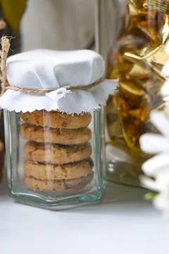 Tiny Cookie Jars with Twine and Floral Decor Foto stock