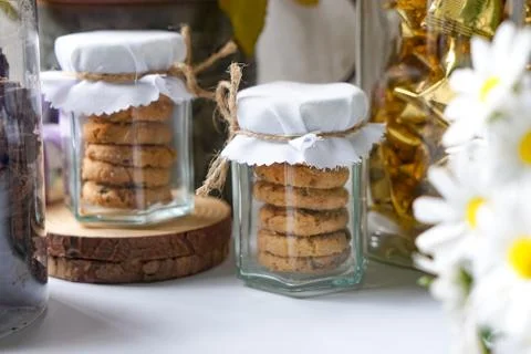 Tiny Cookie Jars with Twine and Floral Decor Stock Photos