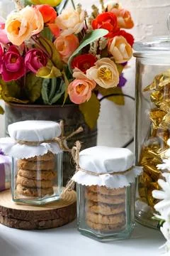 Tiny Cookie Jars with Twine and Floral Decor Stock Photos