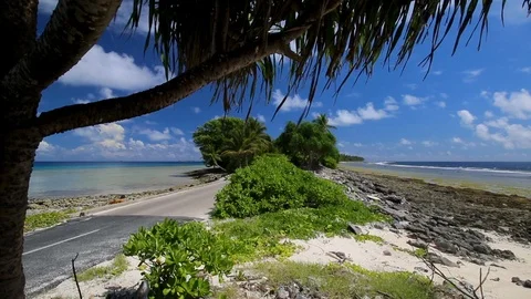 The tiny coral rim of a remote atoll. Tuvalu. Video stock 104600764