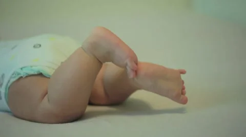 Tiny cute feet of an active newborn baby Stock Footage 53001480