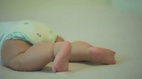 Tiny cute feet of an active newborn baby Stock Footage 53001484