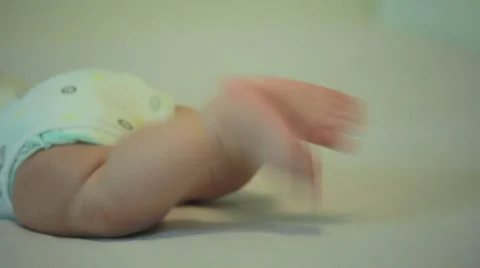 Tiny cute feet of an active newborn baby Stock Footage 53001488