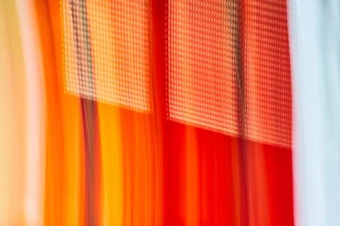 Tiny dot pattern on abstract art of streaks of fiery colors red and orange .. Stock Photos